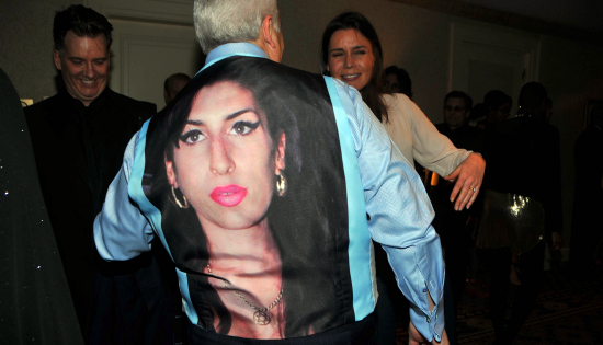 Mitch has Amy on his back