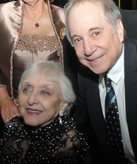 Paul Simon and Arlene Dahl
