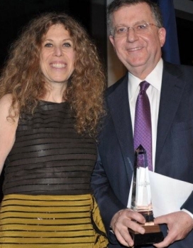 Dr. Julie Mitnick presents to Dr. Daniel F. Roses