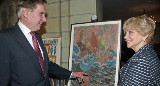 Cynthia and Seymour Reich view art auction