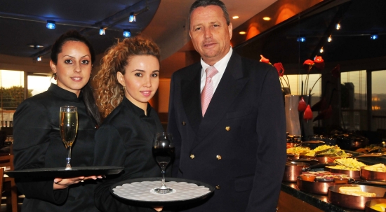 Lior Mucznik with hostesses Liron and Tanya in the King David Executive Lounge.